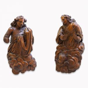 Par de esculturas de pared talladas en madera, 